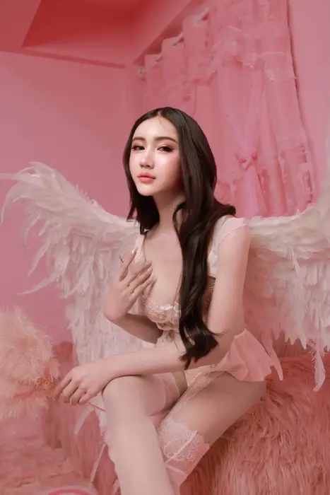 Escort Emmilie Rose Use of fancy clothing/uniforms