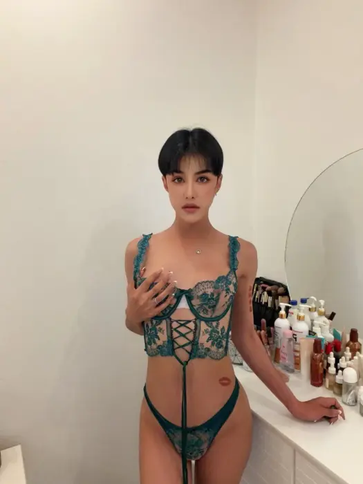 Escort Jade He uses erotic accessories