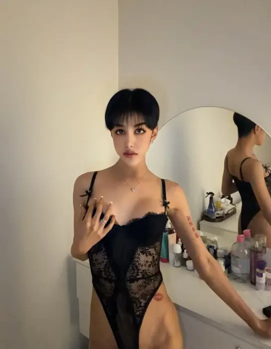 Escort Jade He uses erotic accessories