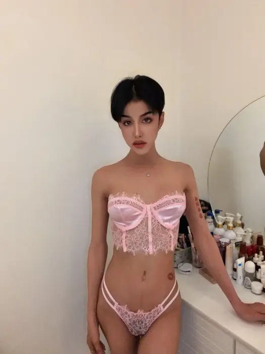Escort Jade He uses erotic accessories