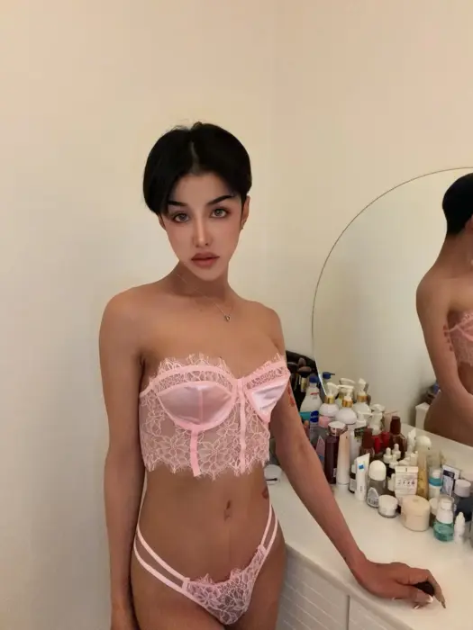 Escort Jade He uses erotic accessories