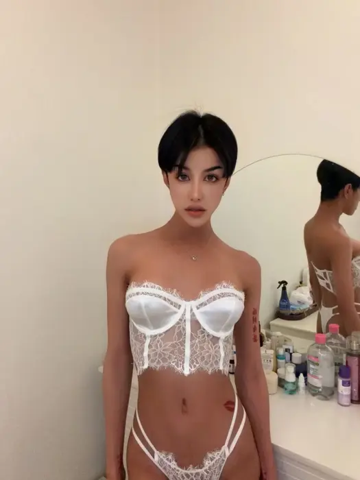 Escort Jade He uses erotic accessories