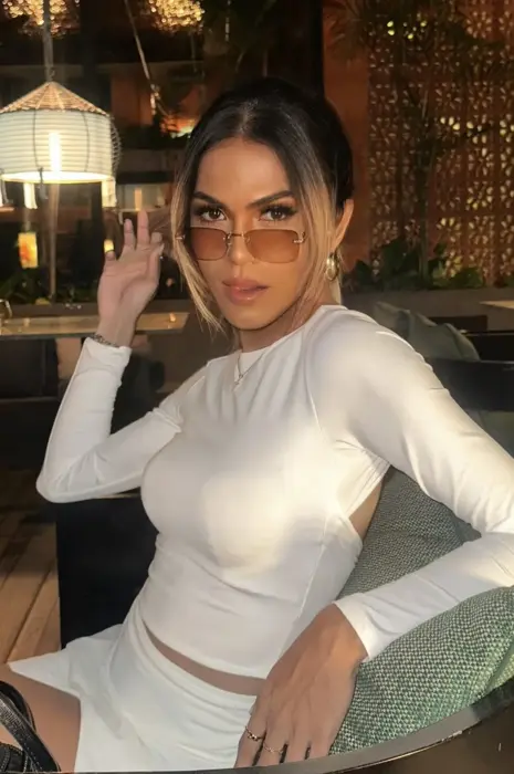 Escort Claire Feminine Tanned Use of fancy clothing/uniforms